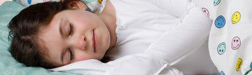 Child wearing organic cotton eczema pyjamas