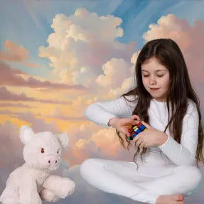 Young girl with a teddy bear against a colorful sky