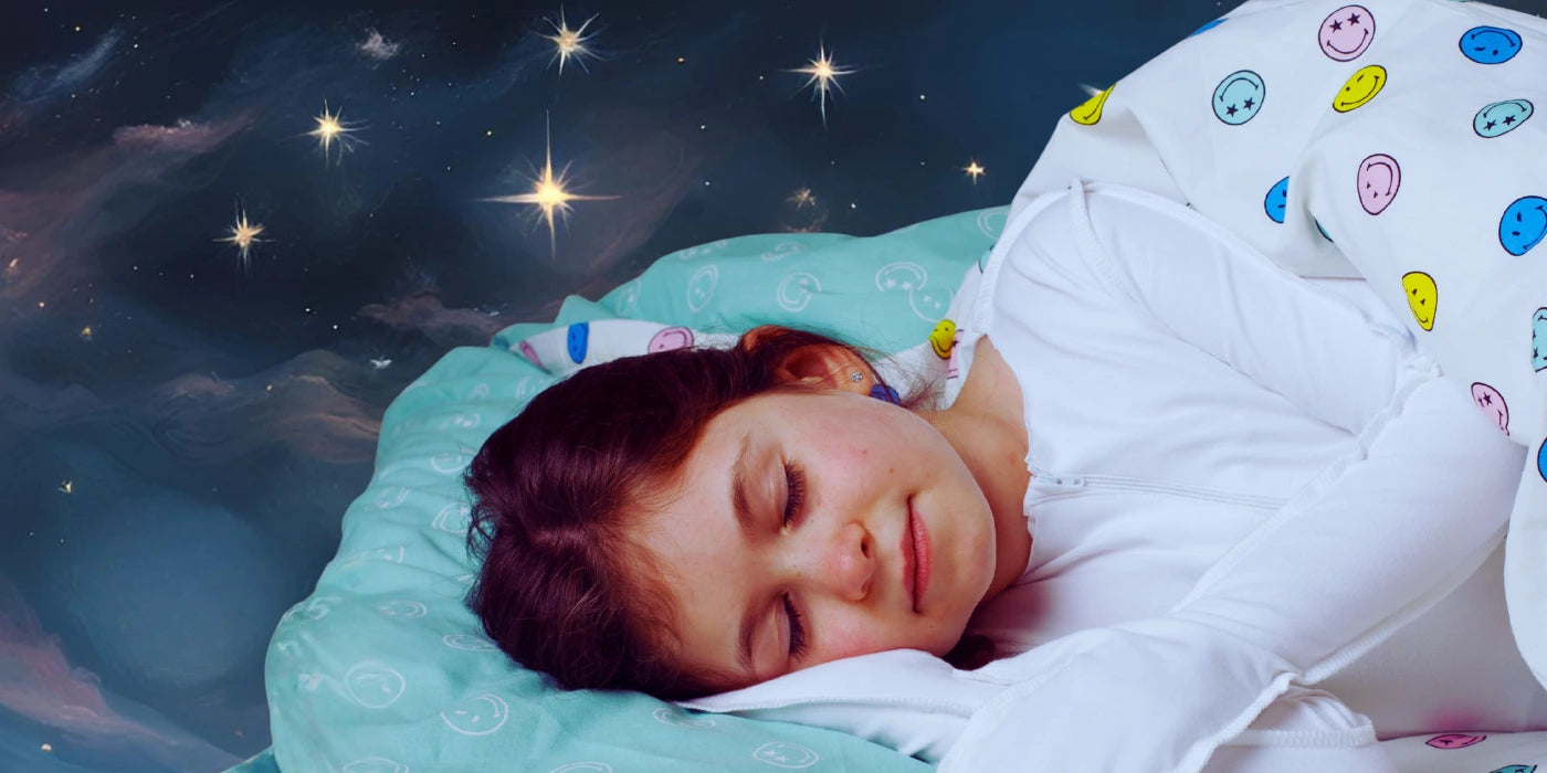 Girl sleeping in colourful bedding, under a night sky with stars.